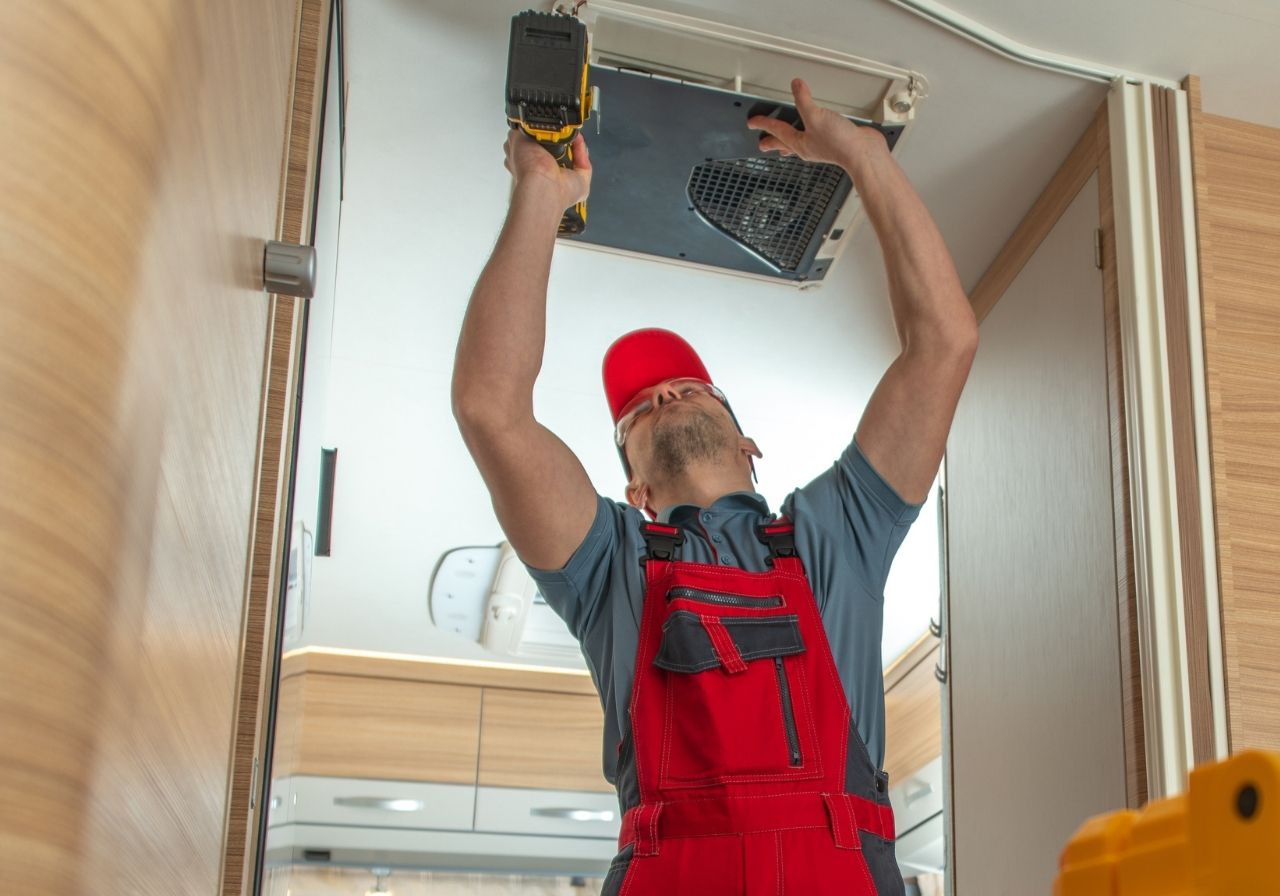 RV family dealing with broken air conditioner in summer heat